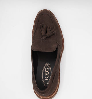 Tods Pebbled Leather Tasselled Loafers in Dark Brown